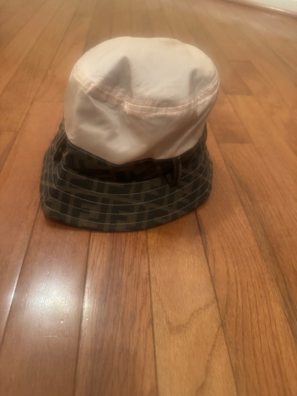 Fendi bucket hat with brown tonal FF Zucca logo-embroidered trim.